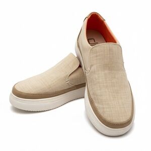 Hey Dude cream and tanSlip-On Shoes with orange lining